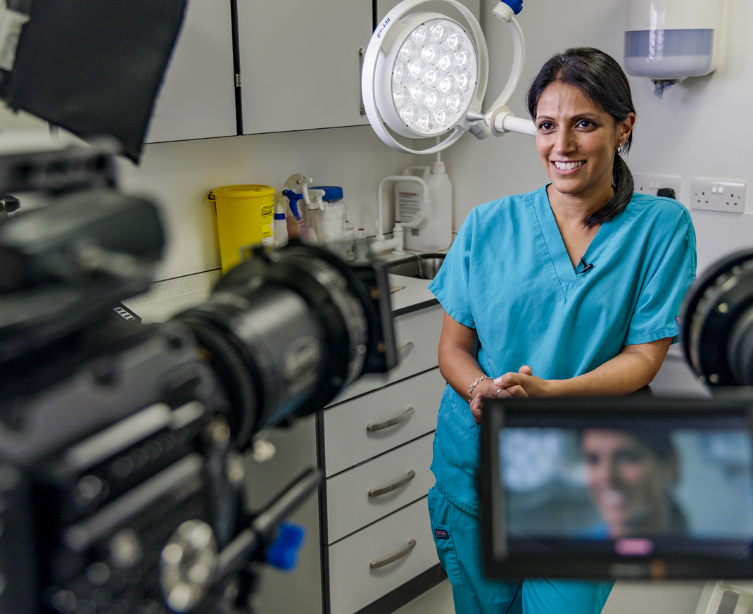 Female veterinary surgeon being filmed for a video